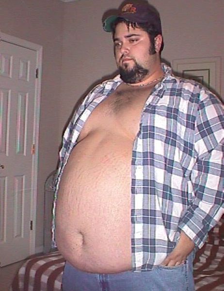 Огромный толстый мальчику. Мужчина с большим животом.